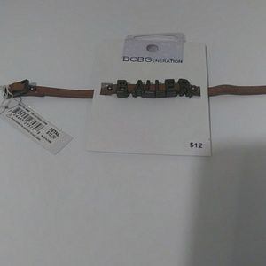 Boys Florescent orange BALLER bracelet.